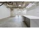 Spacious kitchen features white cabinets, a kitchen island and stainless steel appliances at 505 Whitehall Sw St # 102, Atlanta, GA 30303