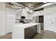 Modern kitchen featuring white cabinets, a kitchen island and stainless steel appliances at 505 Whitehall Sw St # 102, Atlanta, GA 30303