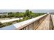 Inviting rooftop deck with wooden railing with lush green trees at 505 Whitehall Sw St # 102, Atlanta, GA 30303