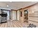 Finished basement features a wood-paneled sauna, work out bench, and luxury vinyl flooring at 5980 Whitestone Ln, Suwanee, GA 30024