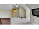 Bonus room area with a ceiling fan, windows, TV, and sofa seating at 5980 Whitestone Ln, Suwanee, GA 30024