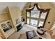 Living Room featuring a fireplace, vaulted ceilings and lots of natural light at 5980 Whitestone Ln, Suwanee, GA 30024