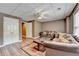 Charming living room with wood floors and access to the rest of the house at 5980 Whitestone Ln, Suwanee, GA 30024