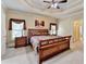 Spacious main bedroom features a tray ceiling and large windows at 5980 Whitestone Ln, Suwanee, GA 30024
