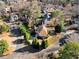 Scenic aerial view of a residential home surrounded by verdant landscaping and winding streets at 971 Ashebrooke Ne Ct, Marietta, GA 30068