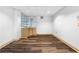 Spacious basement featuring a small bar and modern flooring at 971 Ashebrooke Ne Ct, Marietta, GA 30068