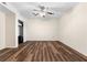 Spacious bedroom featuring hardwood floors, a ceiling fan and neutral paint at 971 Ashebrooke Ne Ct, Marietta, GA 30068