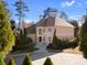 A beautiful home with an expansive driveway and mature trees at 971 Ashebrooke Ne Ct, Marietta, GA 30068
