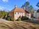 Side view of the home featuring a driveway and a 2-car garage at 971 Ashebrooke Ne Ct, Marietta, GA 30068