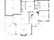 Detailed first floor plan showcasing the layout of the living room, kitchen, bedrooms, and garage at 971 Ashebrooke Ne Ct, Marietta, GA 30068