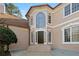 Inviting front entrance with a large arched window and classic architectural details at 971 Ashebrooke Ne Ct, Marietta, GA 30068