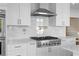 Gourmet kitchen featuring a stainless steel range and custom cabinetry at 971 Ashebrooke Ne Ct, Marietta, GA 30068