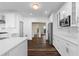 Well-appointed kitchen with white cabinetry and modern appliances at 971 Ashebrooke Ne Ct, Marietta, GA 30068