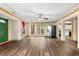 Open living room with a ceiling fan, hardwood floors and natural light at 971 Ashebrooke Ne Ct, Marietta, GA 30068
