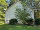 The side of the home with lush landscaping creates a sense of privacy at 2581 Star Ln, Decatur, GA 30034