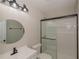 Bathroom with updated fixtures, vanity, and sliding glass door shower at 525 Baker Nw Cir, Atlanta, GA 30318