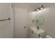 Bright white bathroom with updated fixtures and vanity at 525 Baker Nw Cir, Atlanta, GA 30318
