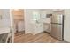 Updated kitchen with stainless appliances, pantry, and access to the laundry room at 525 Baker Nw Cir, Atlanta, GA 30318