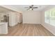 Living room with dining space and stainless steel appliances at 525 Baker Nw Cir, Atlanta, GA 30318