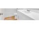 Bathroom with a white vanity, bathtub, and toilet at 614 Glendale Rd, Scottdale, GA 30079