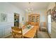 Formal dining area with hutch, chandelier, and decor at 809 Longbranch Ln, Douglasville, GA 30134