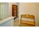 Hallway featuring a wooden bench with heart cutout, and a beautiful wooden bookcase at 809 Longbranch Ln, Douglasville, GA 30134