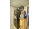Kitchen corner featuring a black refrigerator, microwave, and compact storage solutions for organization at 809 Longbranch Ln, Douglasville, GA 30134