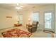Cozy living area with a comfortable recliner and a view of the backyard at 809 Longbranch Ln, Douglasville, GA 30134