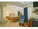 Bright main bedroom with ceiling fan, ample lighting, comfortable seating and attached bathroom at 809 Longbranch Ln, Douglasville, GA 30134