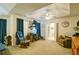 Spacious main bedroom boasting a ceiling fan, desk, plush chair and attached bathroom at 809 Longbranch Ln, Douglasville, GA 30134