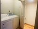 Laundry room with side by side washer and dryer at 1144 Country Ct, Lawrenceville, GA 30044