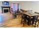 Cozy living room with fireplace, wood flooring, and comfortable seating area at 1144 Country Ct, Lawrenceville, GA 30044