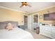 Cozy bedroom featuring an American flag, teddy bear, baseball themed fan and light at 395 Grove Ridge Dr, Loganville, GA 30052