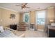 Comfortable bedroom with baseball-themed ceiling fan and decor at 395 Grove Ridge Dr, Loganville, GA 30052