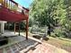 Backyard featuring lush greenery and outdoor trampoline at 627 Arbour Way, Suwanee, GA 30024