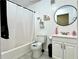 Clean bathroom featuring a shower and vanity with sink at 627 Arbour Way, Suwanee, GA 30024