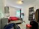Comfortable bedroom with natural light and in-room media hookups at 627 Arbour Way, Suwanee, GA 30024