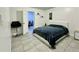 Modern bedroom featuring stylish gray tile flooring and neutral colored walls at 627 Arbour Way, Suwanee, GA 30024