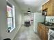 Bright kitchen features a dining area and ample storage space at 627 Arbour Way, Suwanee, GA 30024