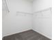 Walk-in closet featuring a carpet floor and wire racks at 1517 Ellie Ridge Ave, Lawrenceville, GA 30043