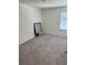 Bedroom featuring neutral carpet with natural light from the windows at 536 Magnolia Cir # 116, Palmetto, GA 30268
