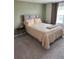 Bedroom featuring neutral carpet and a large bed at 536 Magnolia Cir # 116, Palmetto, GA 30268