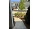 Inviting walkway leading through the front yard of a townhome with fresh landscaping at 536 Magnolia Cir # 116, Palmetto, GA 30268