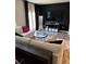 Stylish living room with dark accent wall and comfortable seating with modern decor at 536 Magnolia Cir # 116, Palmetto, GA 30268