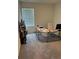 Bright office space with large window, modern desk, and neutral carpeting at 536 Magnolia Cir # 116, Palmetto, GA 30268