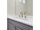Bathroom vanity with grey cabinets and updated fixtures at 6341 Stewart Ridge Walk, Buford, GA 30518