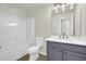 Bathroom featuring a shower/tub combo and a vanity with sink at 6341 Stewart Ridge Walk, Buford, GA 30518