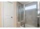 Modern bathroom featuring a glass shower door and a neutral color scheme at 105 Paulowina Cir, Mcdonough, GA 30253