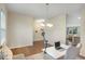 Cozy office space with a desk, chair, hardwood floors, and ample natural light at 105 Paulowina Cir, Mcdonough, GA 30253