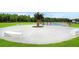 Community playground with modern equipment and open green space perfect for outdoor fun at 105 Paulowina Cir, Mcdonough, GA 30253